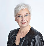 Headshot Cropped Black Jacket.jpg