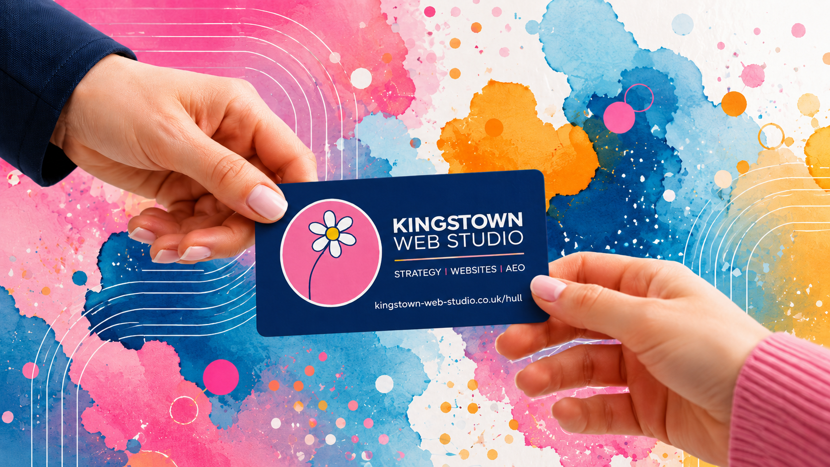 Hands exchanging a Kingstown Web Studio business card against a colourful painted background, illustrating the Business Card Website product.