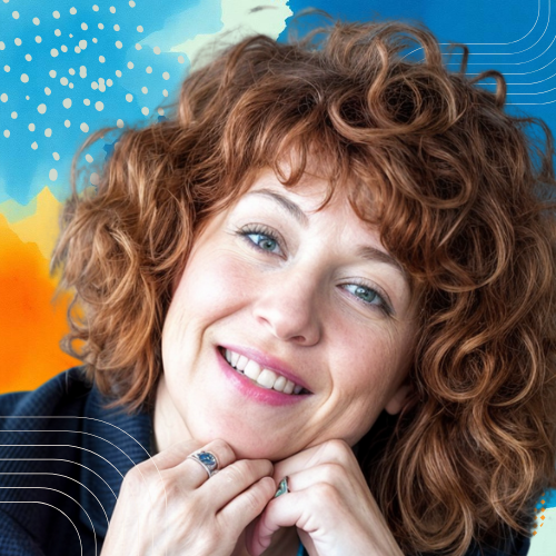 Smiling woman with curly auburn hair against a bright, artistic background, representing the founder of Kingstown Web Studio - Susi Hogan - and her creative journey into small-business web design.