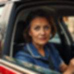 Professional woman seated in her car, symbolizing key worker customers supported with priority slots and discounts by Foxhills Body Shop in Scunthorpe.
