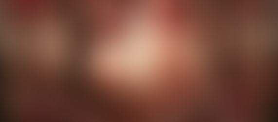 An enchanting autumn woodland scene with richly textured trees in vibrant red and coral hues, their swirling bark echoing hand-stitched patterns. Rolling hills are blanketed in berry-like flowers and fallen leaves, creating a whimsical, storybook atmosphere. A perfect cosy symbol of autumn crafting inspiration, where nature feels lovingly handmade.