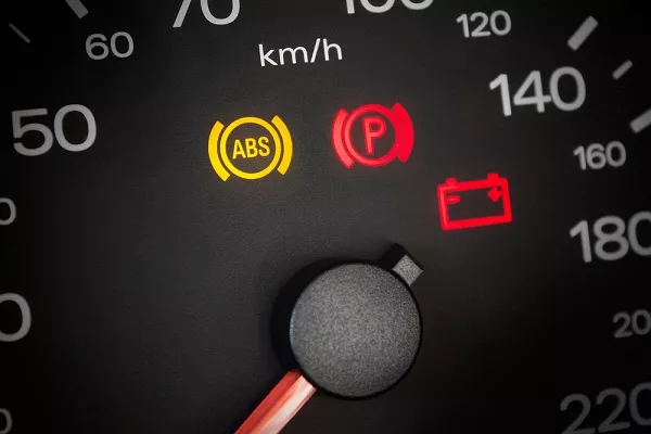 ABS warning light illuminated on vehicle dashboard