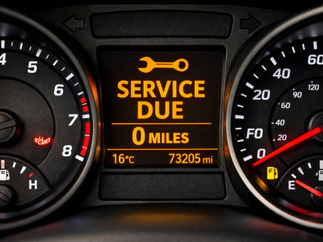 “Car dashboard service due warning light display indicating vehicle service reminder”
