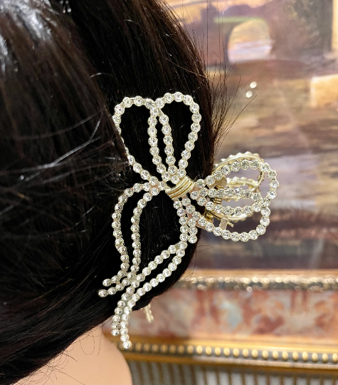 Thumbnail: Gold Rhinestone Bow Hair Claw Clip