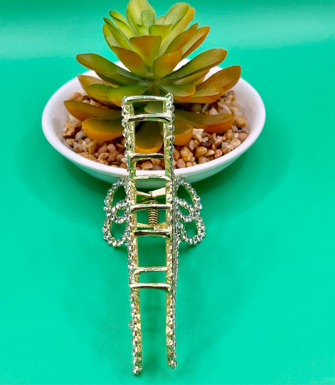 Thumbnail: Gold Rhinestone Bow Hair Claw Clip