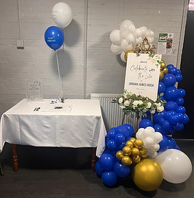 Celebration of life sign with easel and balloons