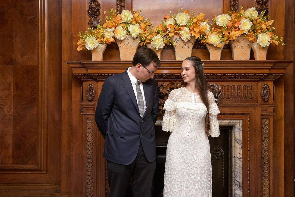 Yana and George during their intimate wedding ceremony at Old Marylebone Town Hall