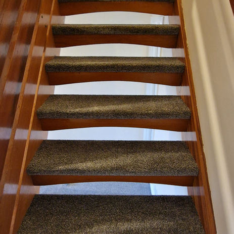 Open riser stairs with quality pile carpet installation