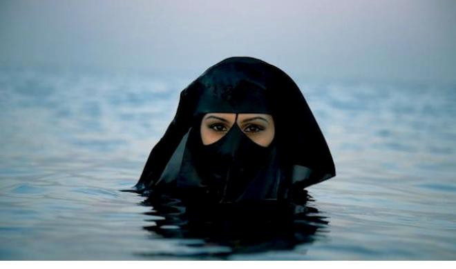 Image from Saudi Arabia Photographer Sebastian Farmborough went to Saudi Arabia and saw this woman out at sea. © Sebastian Farmborough