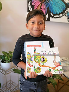 Elias with my books.jpg