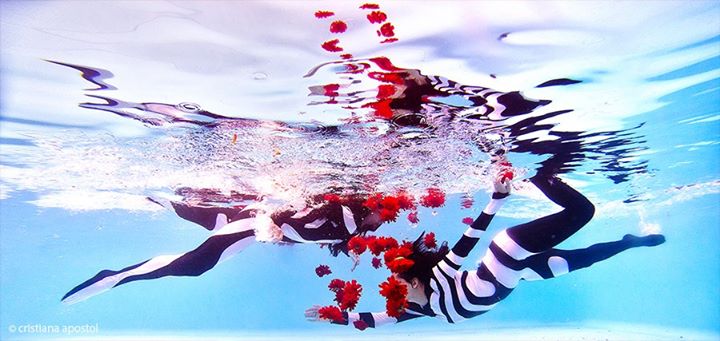 Child's Play — underwater concept photograph by Cristiana Apostol