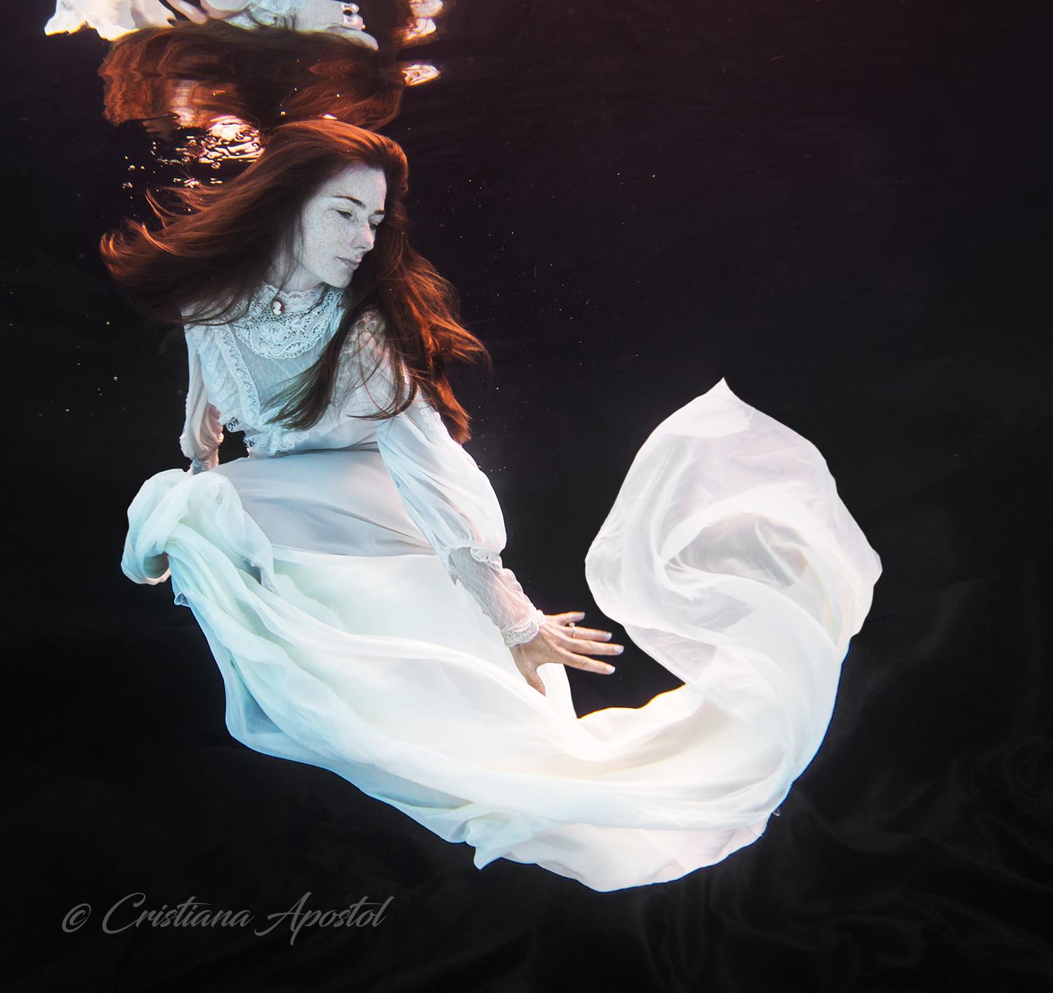 Moon — underwater concept photograph by Cristiana Apostol