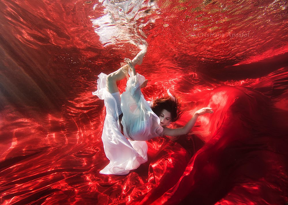 Red · IV — underwater concept photograph by Cristiana Apostol