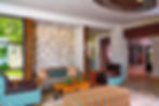 Fredericksburg Inn and Suites hotel lobby with colorful sitting area