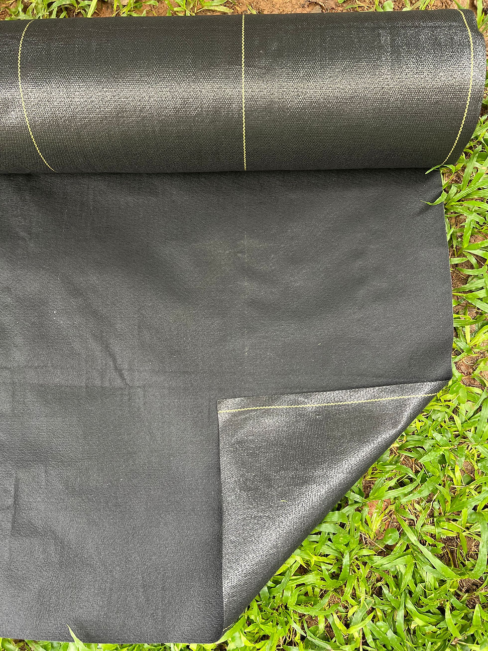 Close-up view of robust landscape fabric installed in a garden