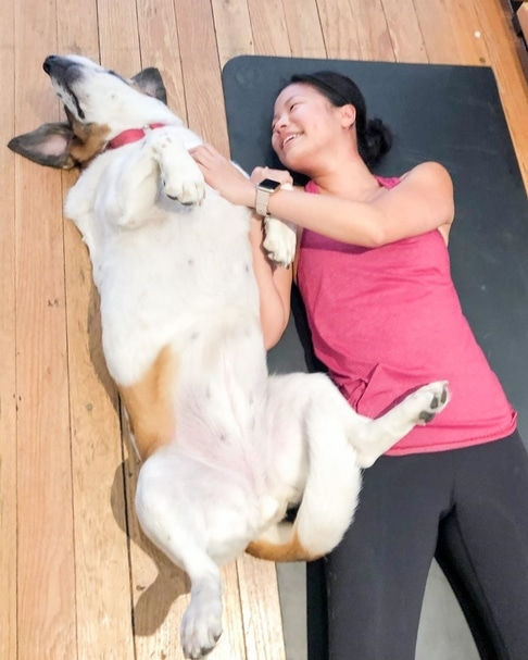Hank and Sandy practicing yoga together at home