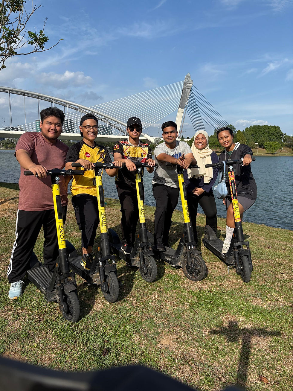 A group of 6 people riding TRYKE e-scooter alongside Perdana Lake-Ayer8 for Group Pass as low as RM75.00 for 1 hour