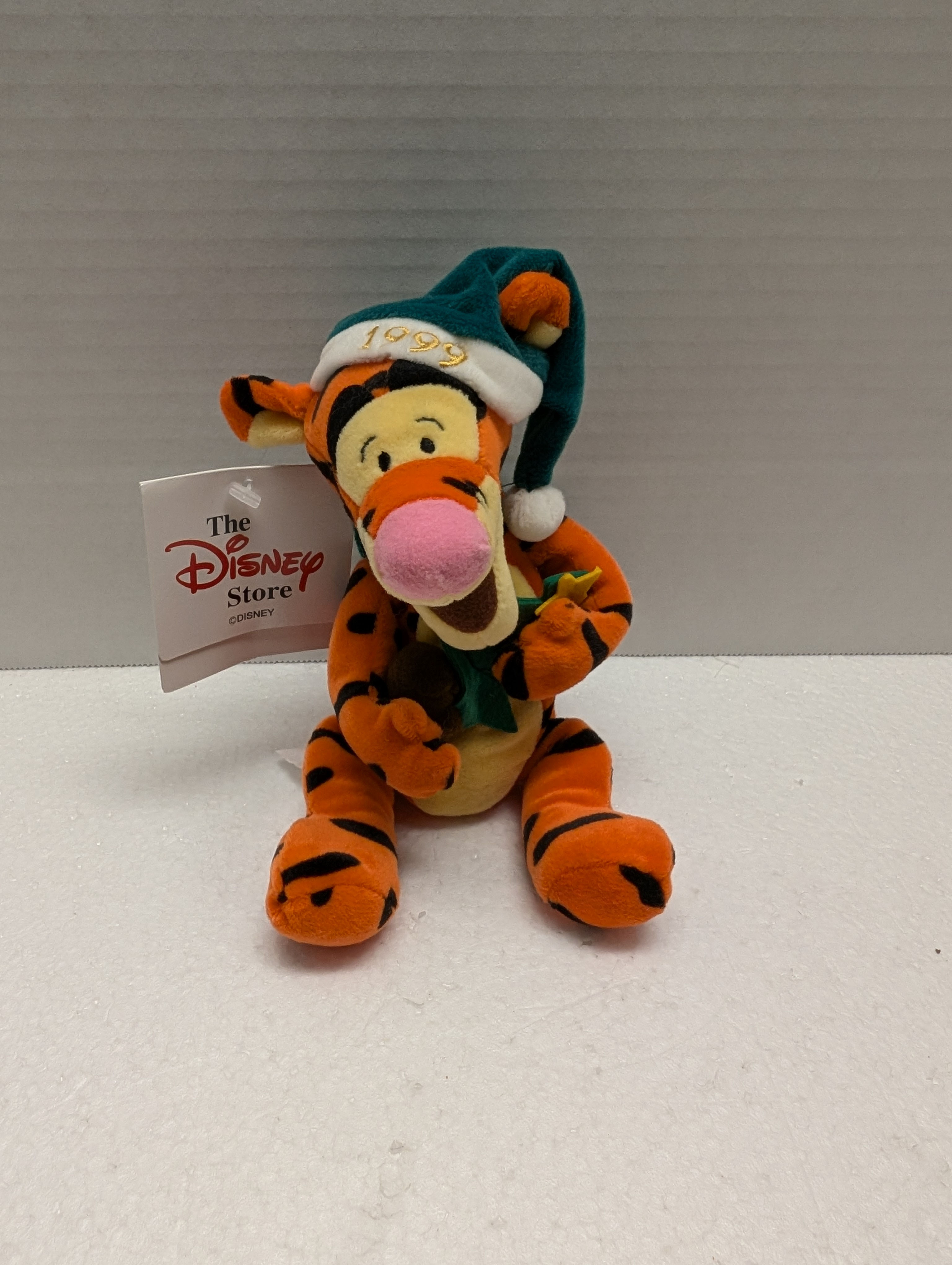 Disney Bean Bag Tigger with Green Santa Hat and Green Scarf.