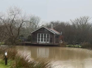 Property in Flood Zone 2 showing need for professional flood risk assessment