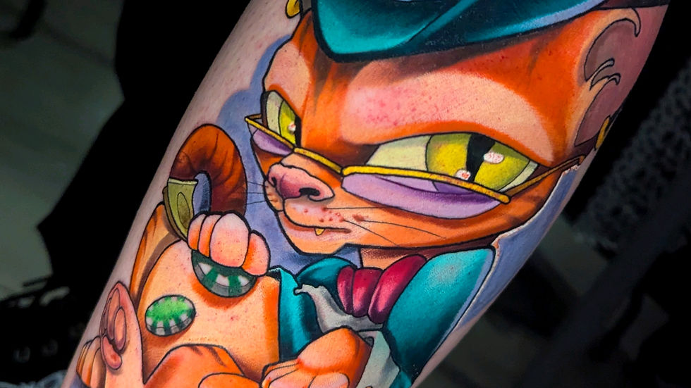 Tatouage couleur d'un chat joueur par un tatoueur Montpellier.