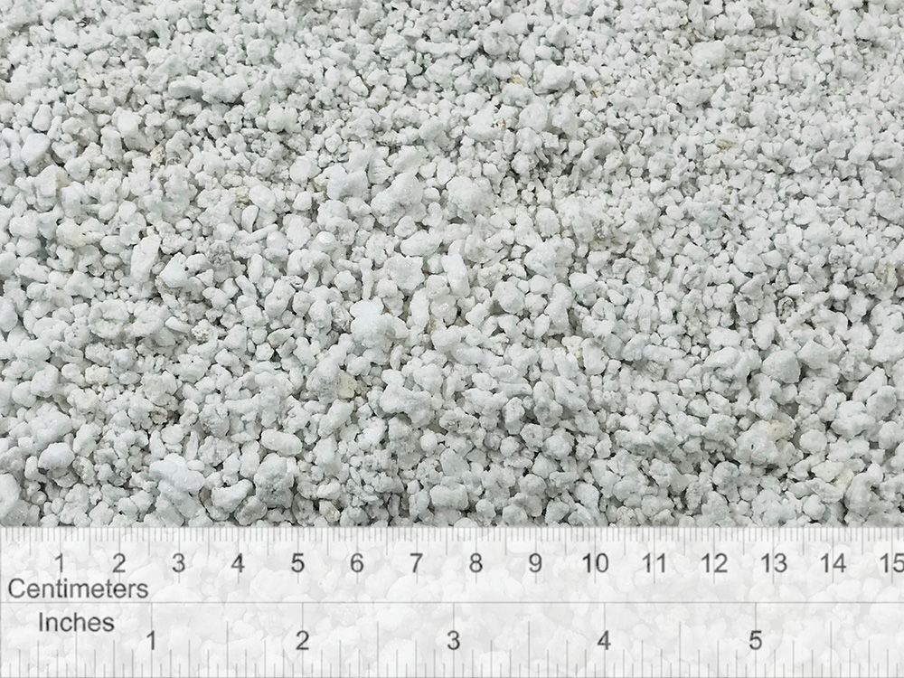Fine perlite soil amendment used to improve drainage and aeration in potting soil.