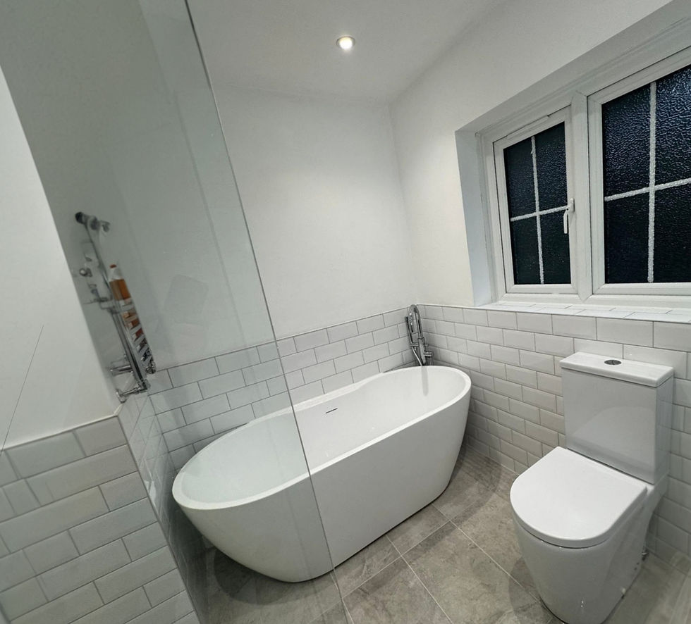 Main bathroom with freestanding bath