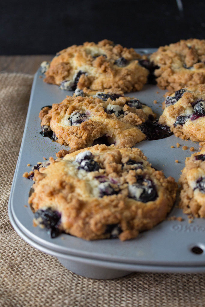 These giant blueberry muffins are super moist, loaded to the gills with blueberries and topped off with the best brown sugar cinnamon streusel topping ever! You'll love them!