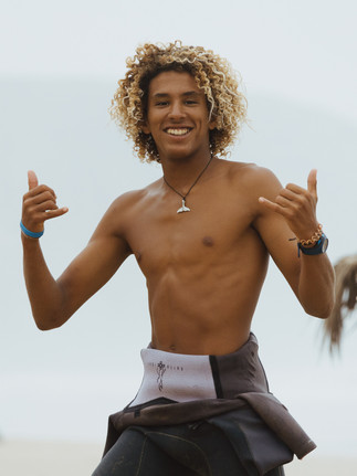 Local surf guide welcoming guests during a retreat in Morocco