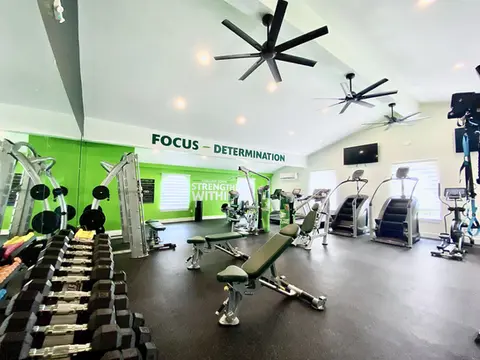 Find focus and determination within our fitness center weight room!
