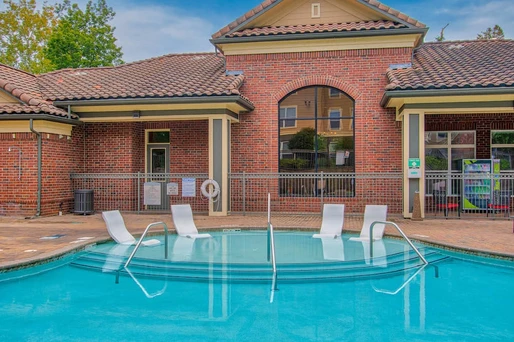 A relaxing sun deck inside our pool