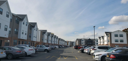 Rail Yard Building Exteriors and Parking Lot - Apartments on University of Delaware Campus