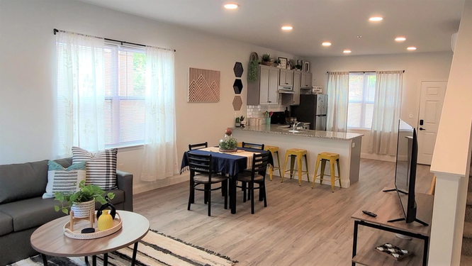 55" Flat Screen HDTV in Every Livingroom