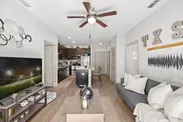 Living Room w/ Flat Screen HDTV & Ceiling Fan
