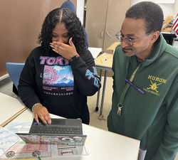 Working on project with teacher Anthony Stewart