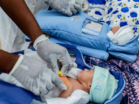Twins staying warm in the Embrace Incubator