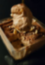 Authentic Italian tiramisu scooped from a dish