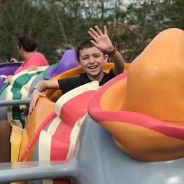 Boy in Dumbo ride