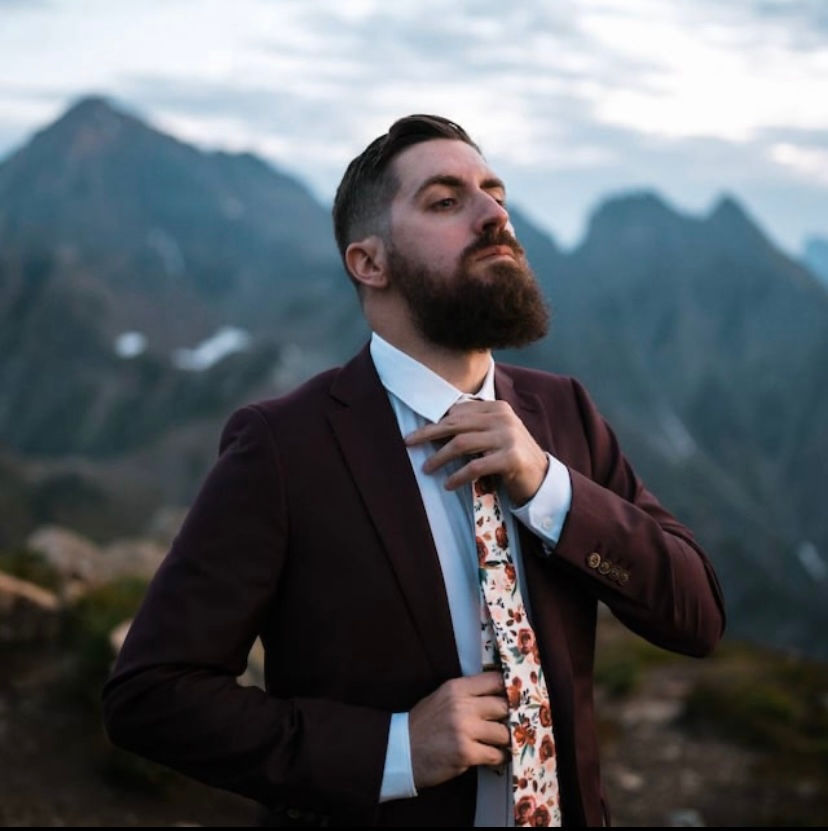 A bowtie wearer in the mountains