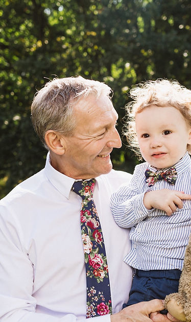 Grandfather and Grandson dressed in arsenic and old lace bowties and tie