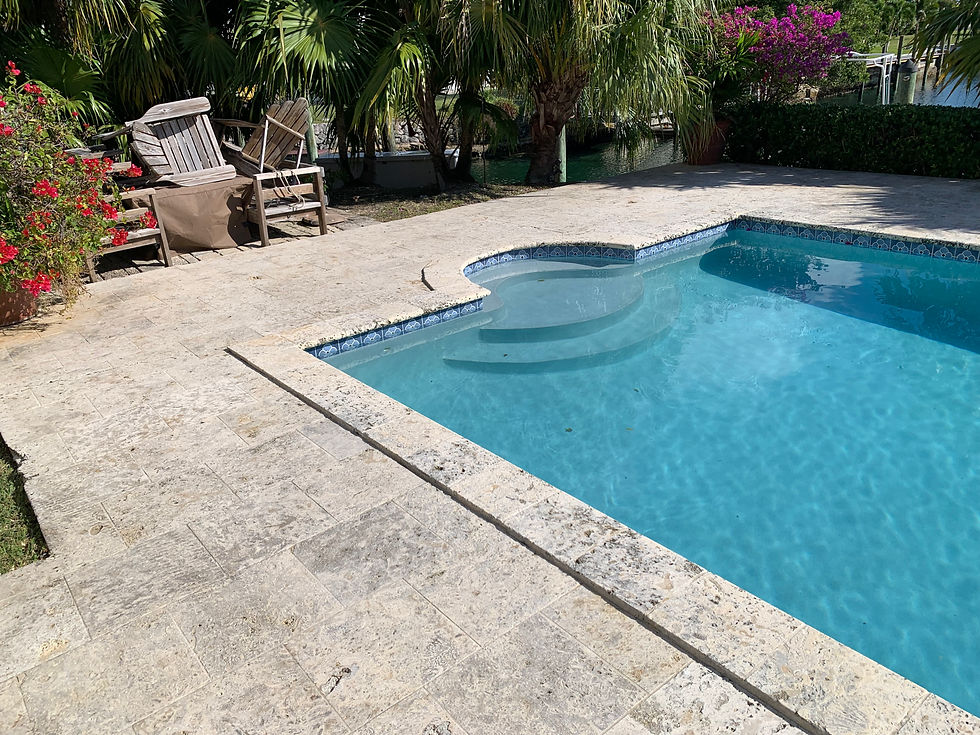 An example of a freshly cleaned and sealed pool deck