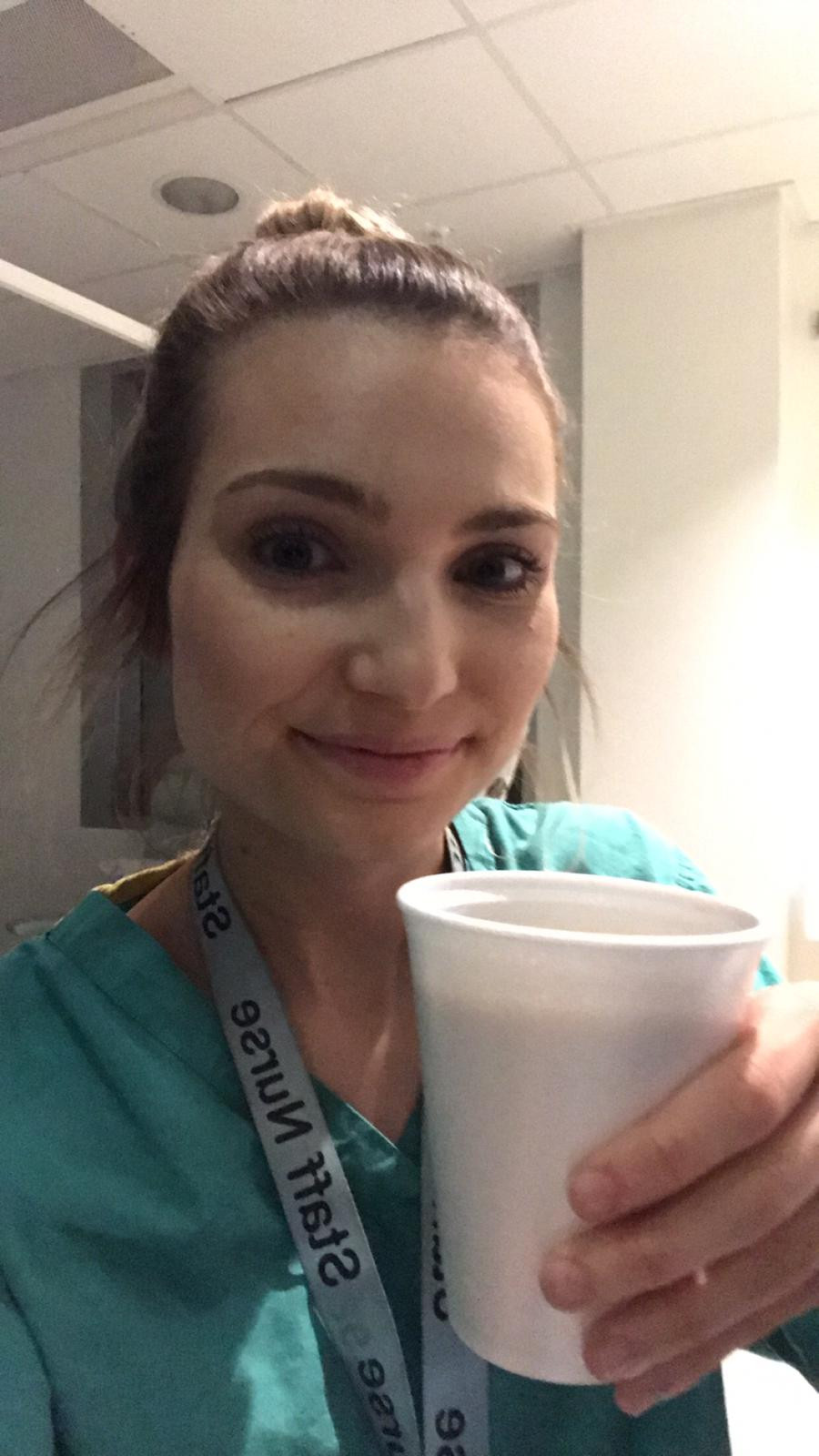 travel nurse and lifestyle blogger kirsten conrad drinking coffee
