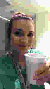 travel nurse and lifestyle blogger kirsten conrad drinking coffee