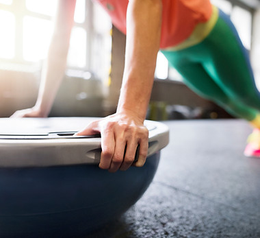 woman on a balance trainer