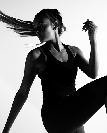 medium-shot-fit-woman-grayscale.jpg