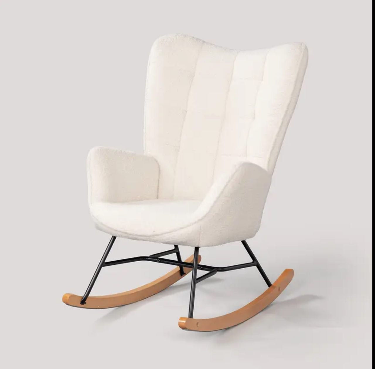 Ivory boucle NordGlide rocking chair with black metal frame and wooden rockers, ideal for modern Estonian interiors.