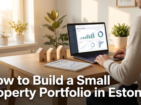 Property investor at a Scandinavian desk with three model houses and a laptop showing portfolio dashboard
