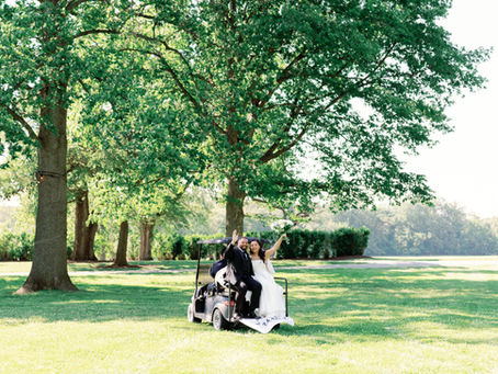 Bride and groom on a golf cart after their wedding ceremony at Brittland Manor