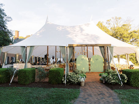 Tented wedding reception on the brick patio at Brittland Manor