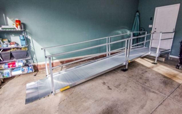 temporary wheelchair ramp installed at garage entrance Wisconsin home