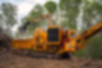 rotobec loading horizontal grinder with brush, debris pile